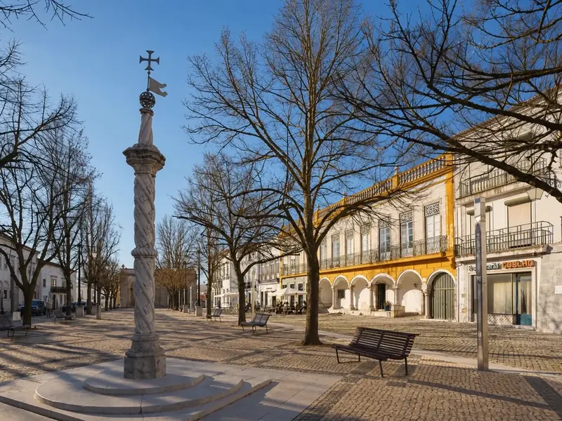 The pelourinho column and arcaded square of Praça da República in Beja